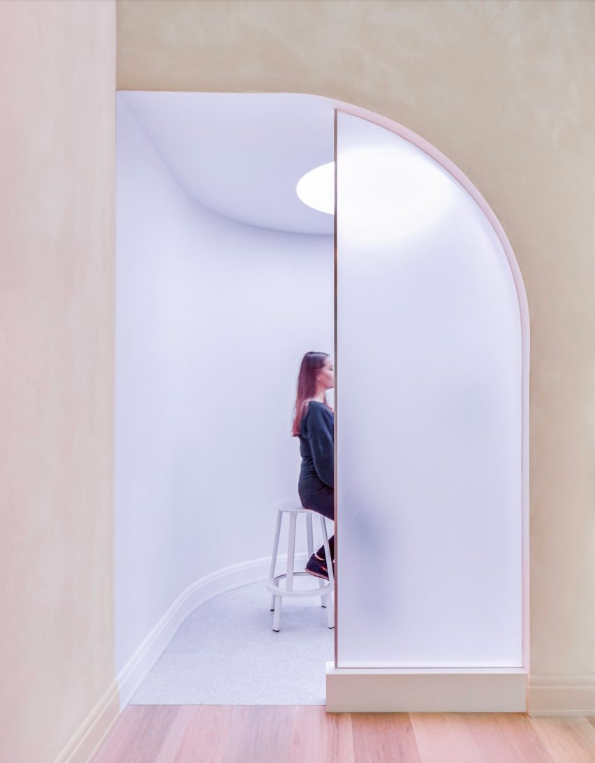 Translucent lilac 3form Chroma resin panel half encloses a photo booth at the Modern Age clinic