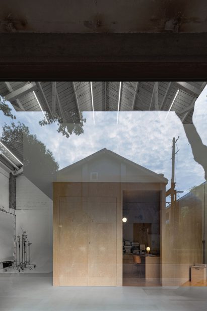 Image of HNS Studio from the exterior through a window