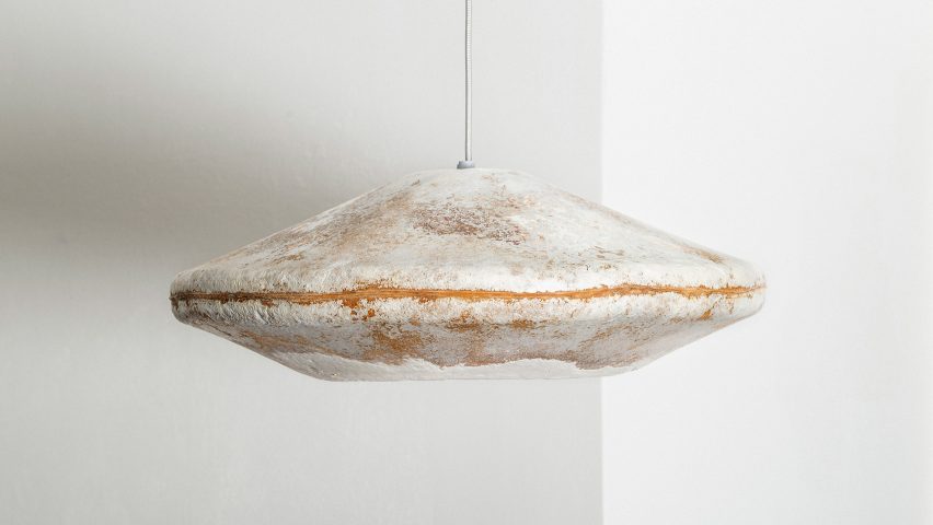 A white and brown lampshade by Myceen