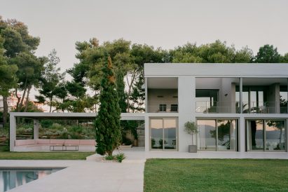 Exterior image of the rear of Grid House from its garden