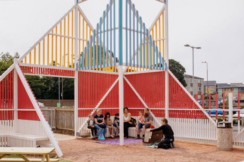 Colourful timber batten structure with seating