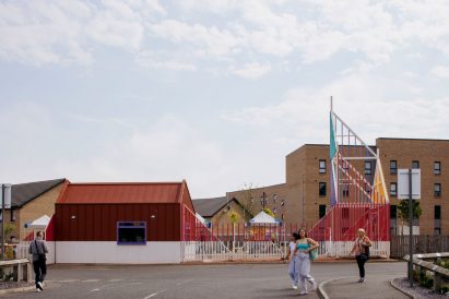 Entrance structure and steel-clad cafe of Walk-Up Avenue by New Practice