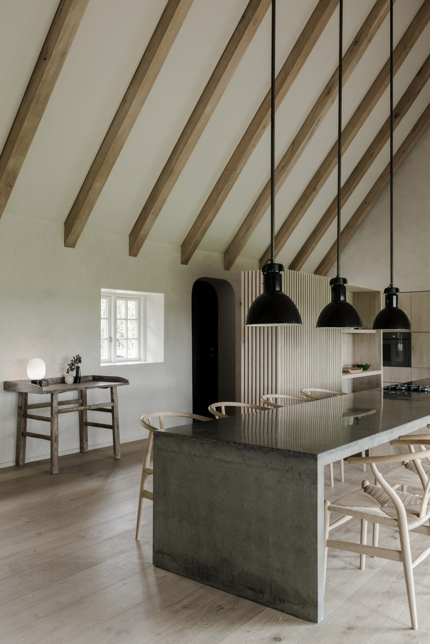 Kitchen and dining room in Nieby Crofters Cottage by Jan Henrik Jansen and Marshall Blecher