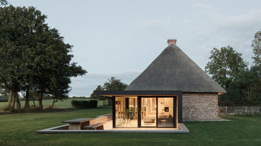 Thatched roof and glazed extension of Nieby Crofters Cottage by Jan Henrik Jansen and Marshall Blecher