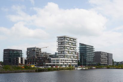 Stories housing from afar and the buildings that surround it