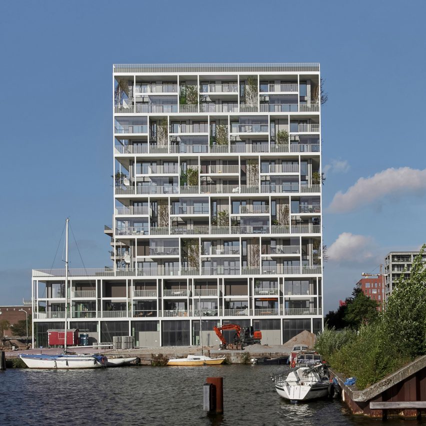 Planted balconies surround housing cooperative apartments in Amsterdam by Olaf Gipser Architects