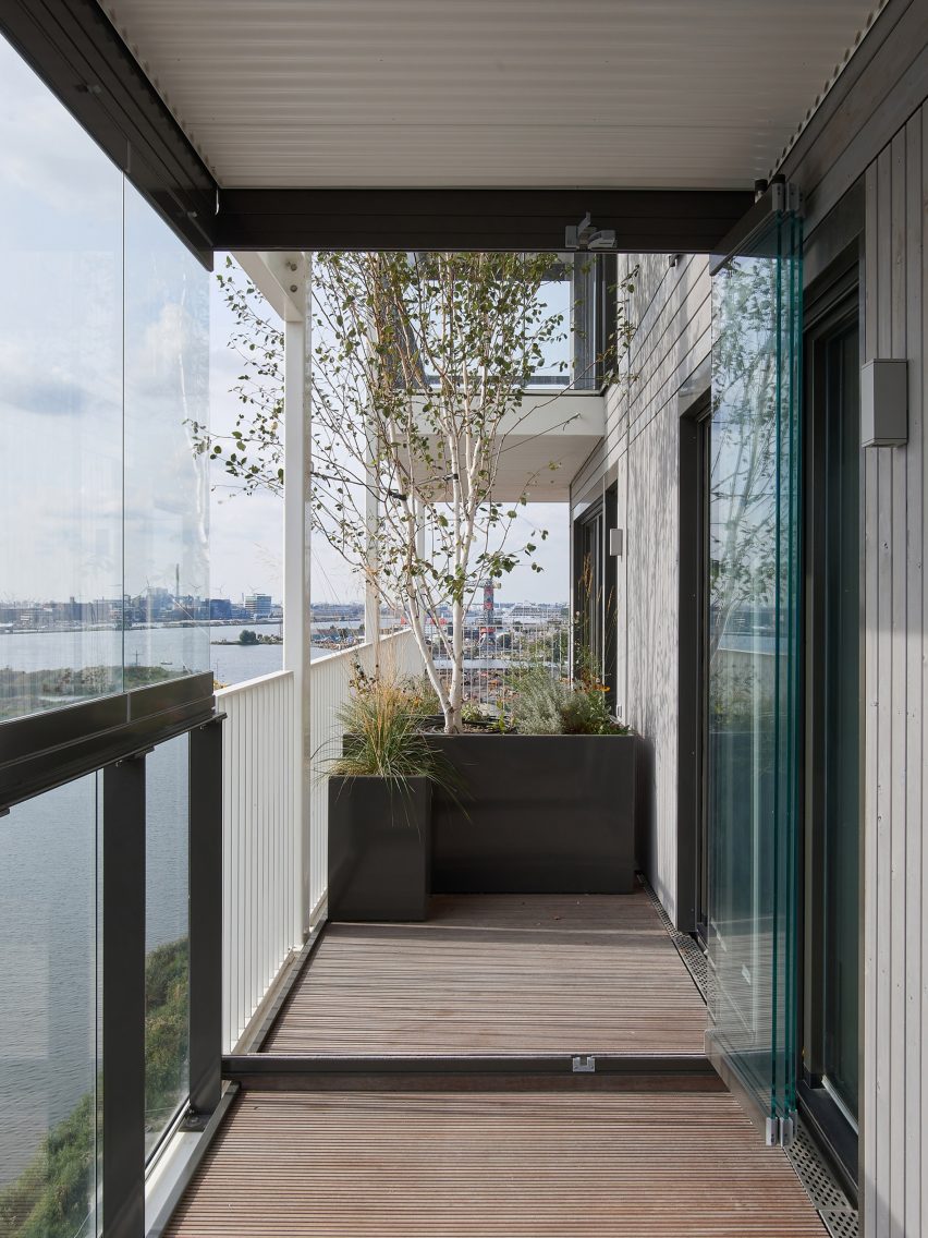 Planted balconies surround housing cooperative apartments in Amsterdam by Olaf Gipser Architects