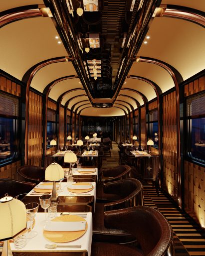 Interior view of the dining area, which has dimmed lighting, a mirrored ceiling and cosy seating