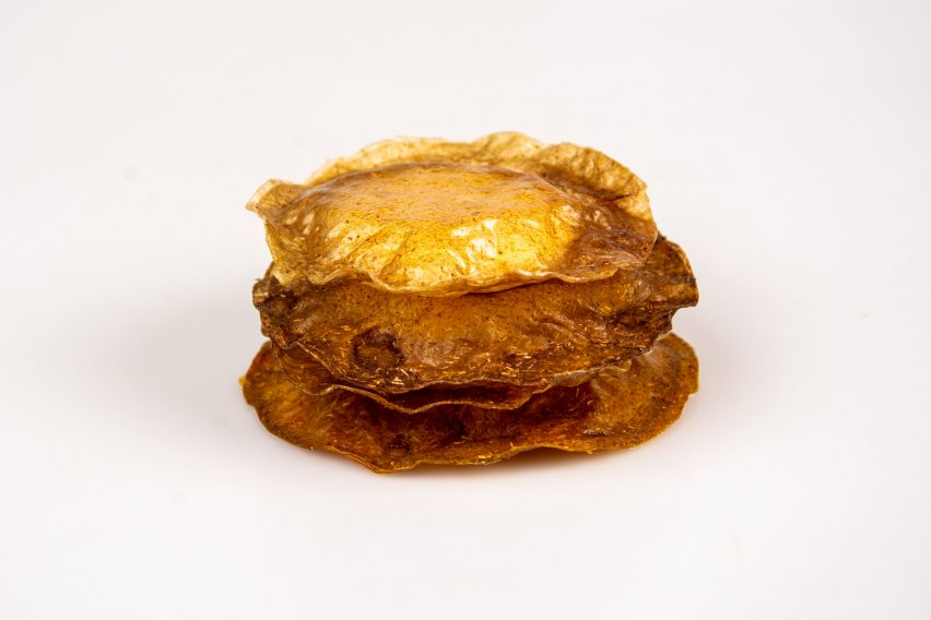 Stacks of rounded brown soap packaging