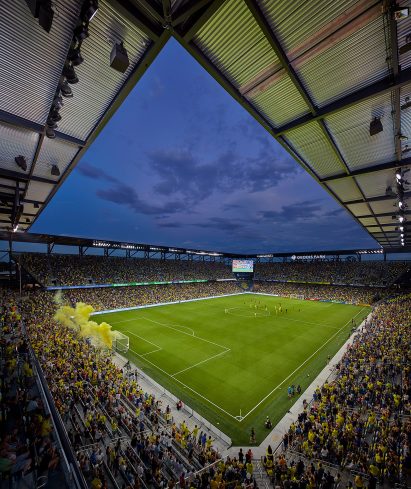 Interior of Geodis stadium with canopy and fans