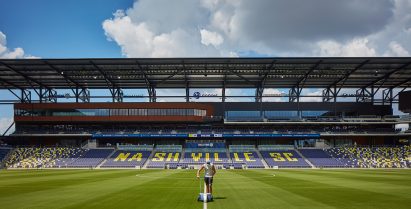 Canopy and lawn mower at Geodis soccer stadium
