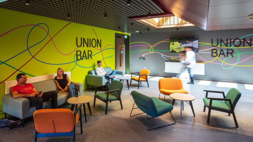 Interior of One Elmwood student hub at Queens University in Belfast by Hawkins\Brown and RPP Architects