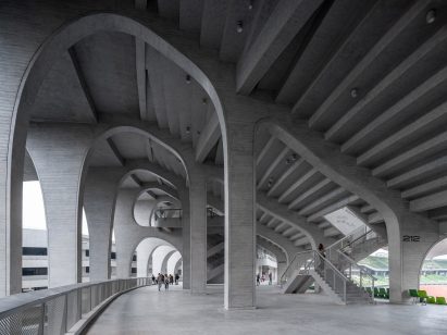 Cave-like entrances to Chinese stadium