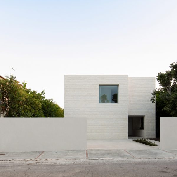 Exterior image of the white brick clad Brick House