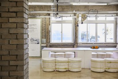 Interior image of the sports store and its jerry can seating
