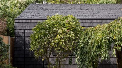 Studio clad with black shingles