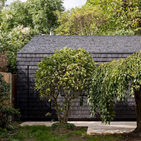 Studio clad with black shingles