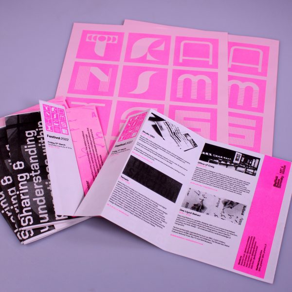 Fluorescent pink and black magazine print