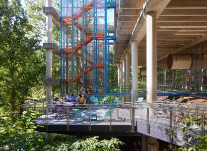 Suspended terraces and staircase outside of brutalist building