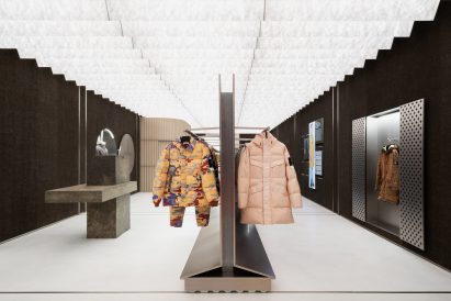 Clothing displayed on metal racks