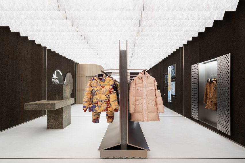 Clothing displayed on metal racks