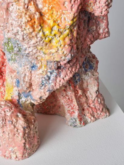 Close up of the vase showing the textured surface and mix of colours