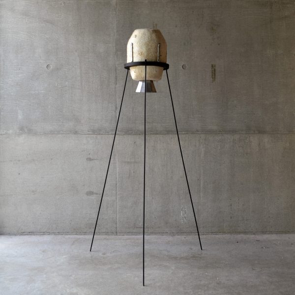 Living with Wildfire mycoremediation pod by Suzie McMurtry on metal stilts