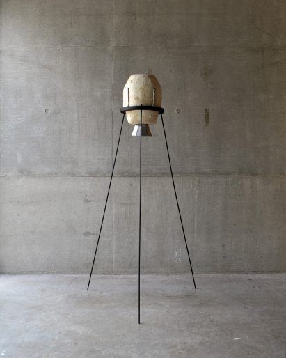 Living with Wildfire mycoremediation pod by on metal stilts