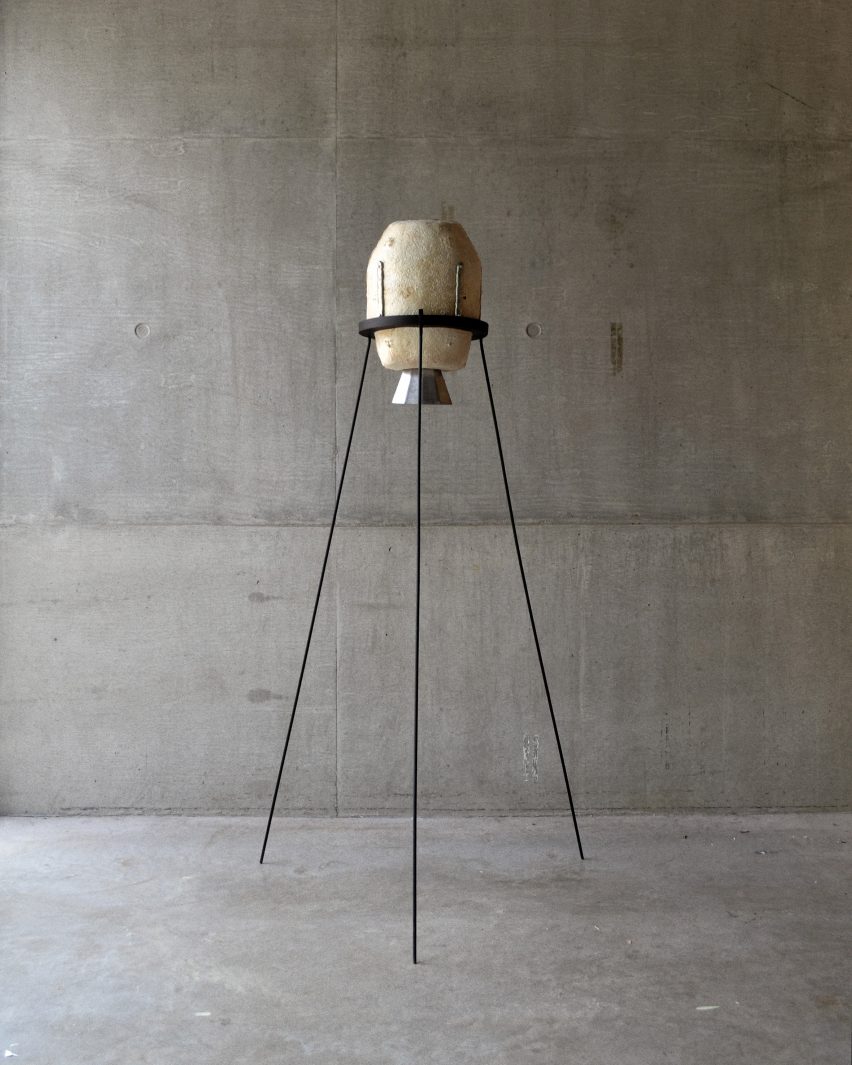 Living with Wildfire mycoremediation pod by on metal stilts