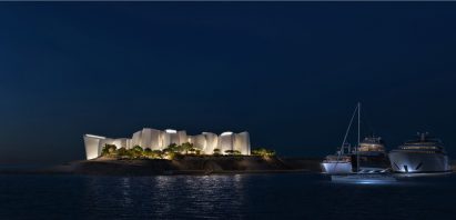 Night time view of white concrete building in Saudi Arabia