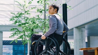 Person using Wheeliy 2.0 wheelchair by Quantum