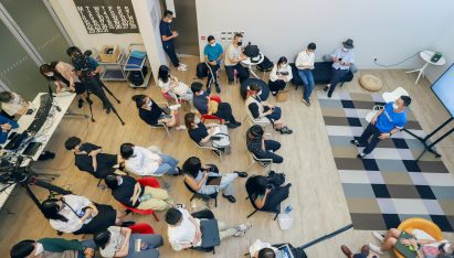 A number of students working on a group project together