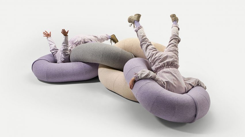 A photograph of people playing in the Loop and Link sofa collection