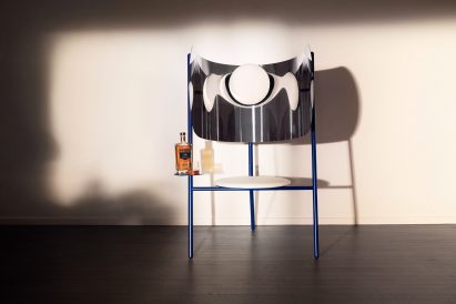 winged chair with silver back