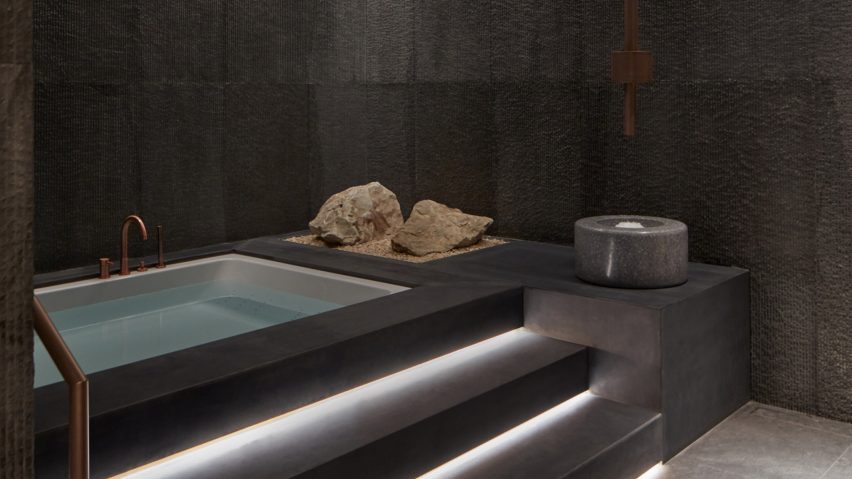 Studio N highlights textured materials with lighting at Dubai spa