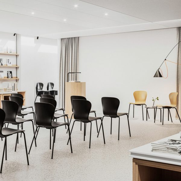 Photo of black and wooden chairs