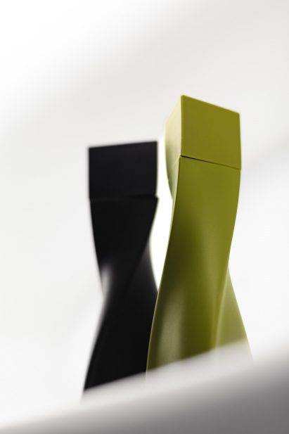 Green and black salt and pepper grinders