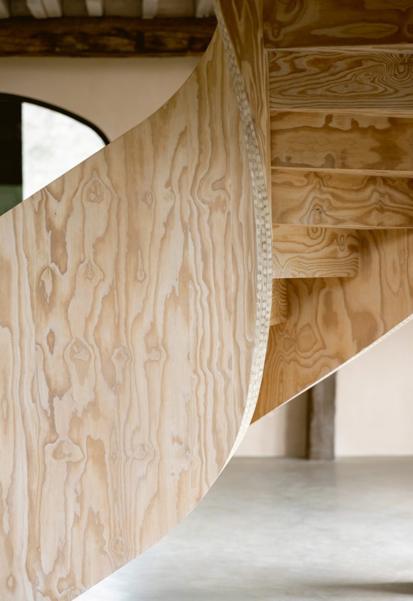 Plywood spiral staircase in Barn at the Ahof by Julia van Beuningen