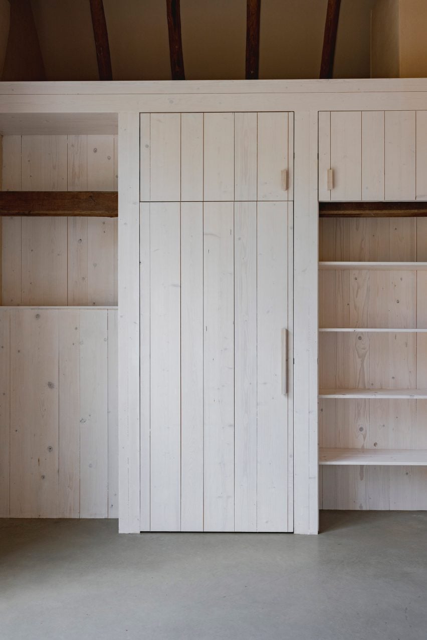Bathroom door and closets in Barn at the Ahof by Julia van Beuningen