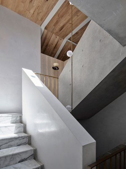 Concrete stairwell with marble steps