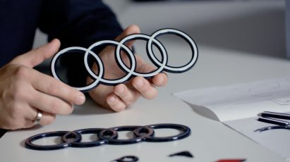 A white and black Audi car logo