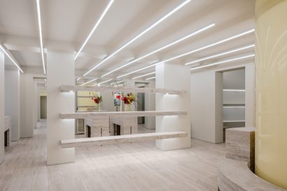 Travertine shelves in Axel Arigato Berlin flagship
