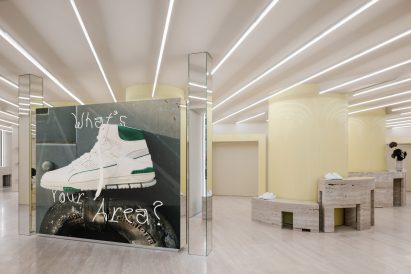 LED display flanked by mirrors in Axel Arigato flagship