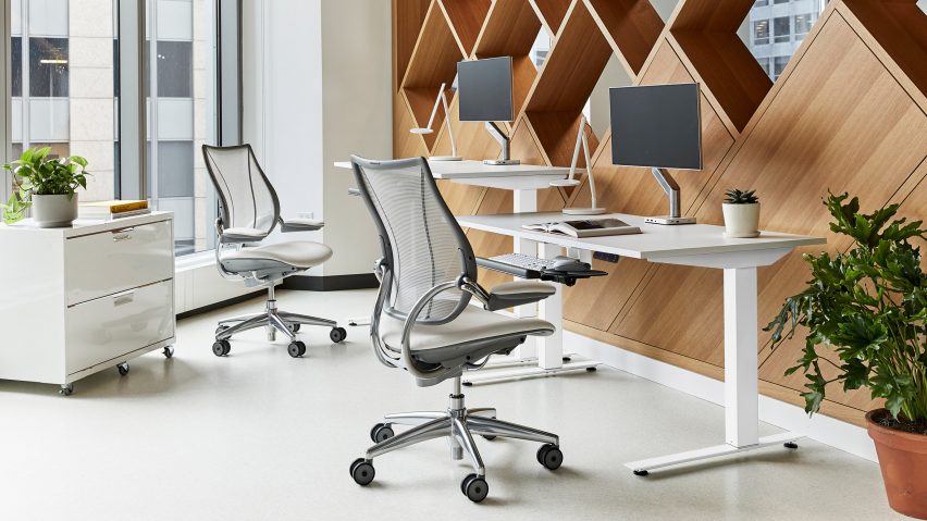 A white adjustable office desk by Humanscale