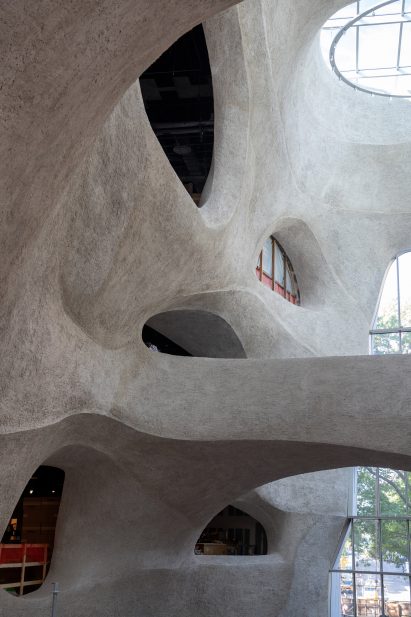 Shotcrete interior atrium with bridge and skylight