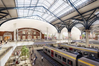 Interior of trains pulling into Victorian trainshed in London