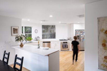 An open plan kitchen inside Highway House