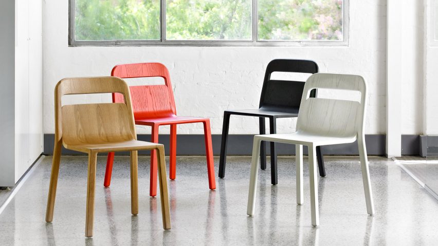 Hollywood chairs in a range of colours in front of a window