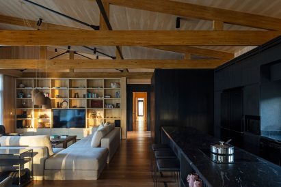 Living room and kitchen of House in the Delta by MAPA