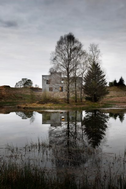 Hundred Acre Wood beside lochan in Scotland